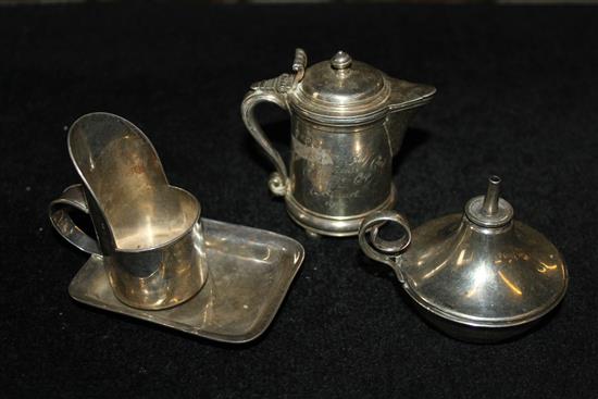 Miniature silver jug, table lighter and a candle holder